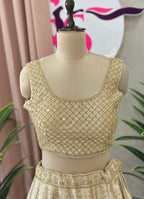 Elegant Layered Lehenga with Rich Traditional Handwork